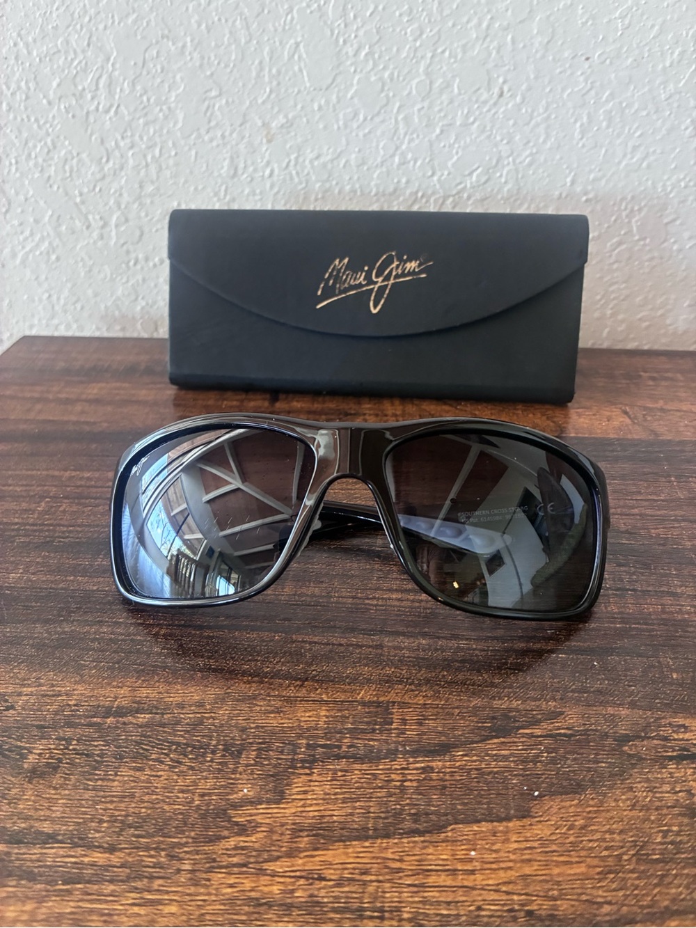 Maui Jim Men's Polarized Black Frame Sunglasses with Dark Lenses